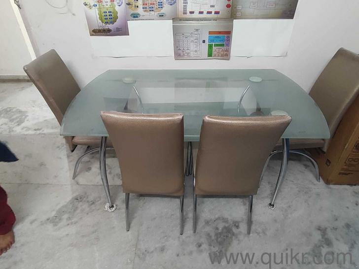 Godrej Interio Glass Top Mounted and Steel build 6 seater dining table