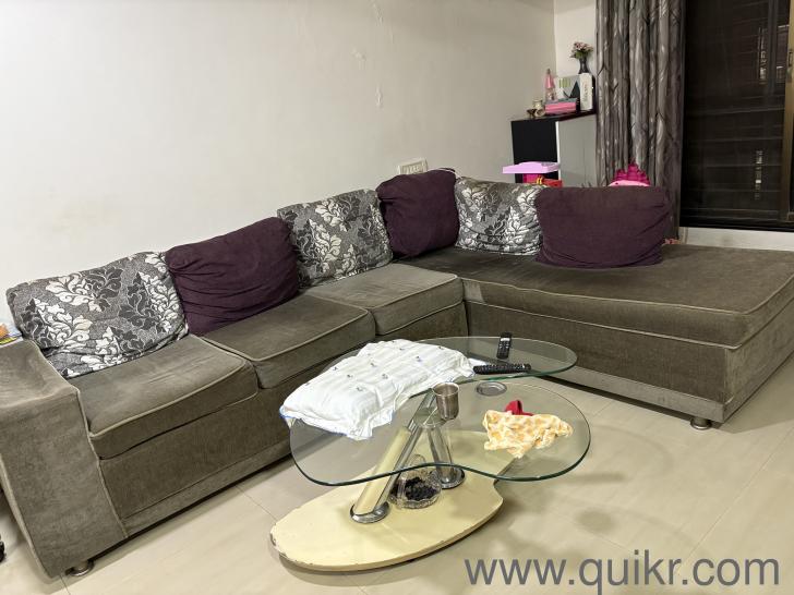 5 seater grey sofa with 5 big cushions in a decent condition