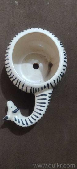 Ceramic planters . Rehoming it as lack space .