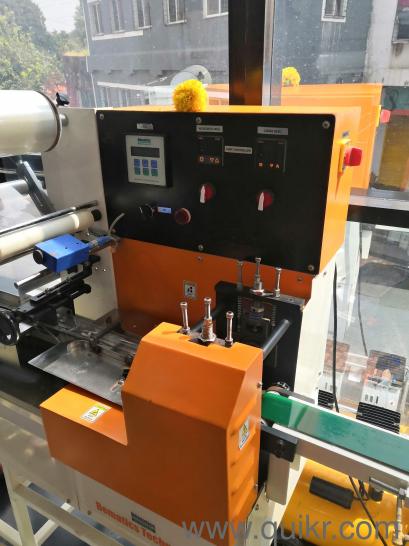 FLOW WRAP PACKING MACHINE