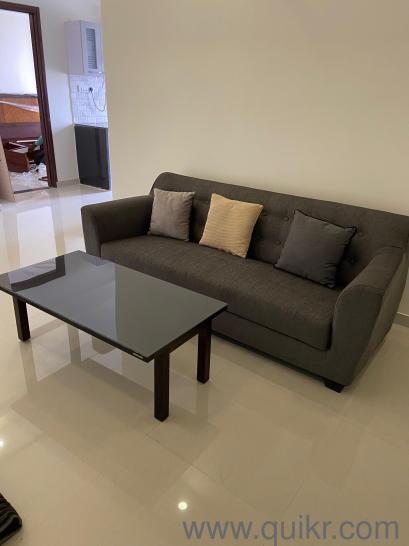 3 seater sofa with centre table and cushions
