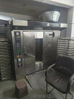 96 tray gas oven and 50kg mixer and slicer and mould and tray and teble