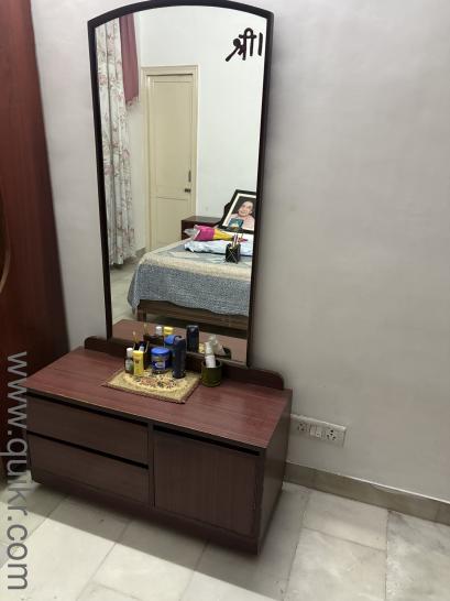 Excellent wall unit teak polish L shaped size 5 fix 4 ft price 7500// and one dressing table with drawers and big mirror 3500/-(2)