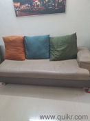 L shaped sofa, separable into two with 4 pillows.(4)