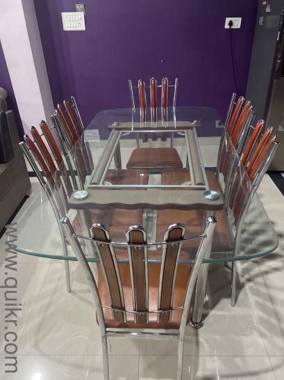 Glass top dining table with 6 chairs(2)