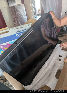 Sony TV with speaker and fire stick(1)