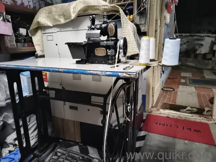 Sewing interlock machine