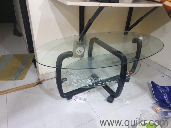 A combo offer Teak bed (6*7 feet), Glass centre table, shoe rack and