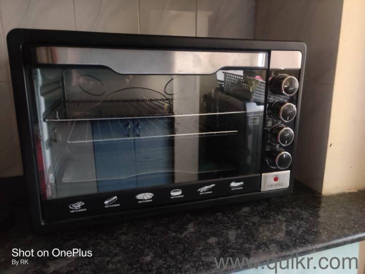Croma 48 litres OTG, as good as new, very useful for home bakers