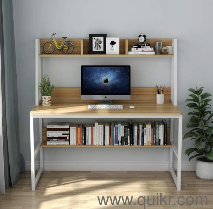 Spacious study table with open book shelves and lots of storage ...