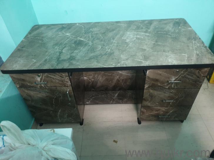 Md office table with rolling chair, less used, no dents and scratches, fully laminated