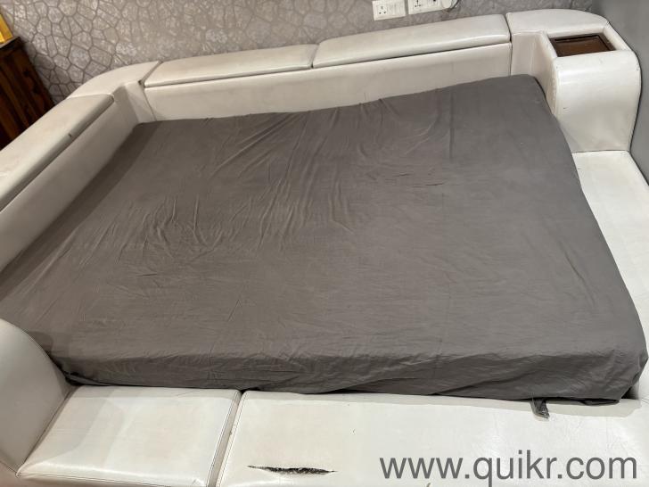 Upholstered bed with double mattress