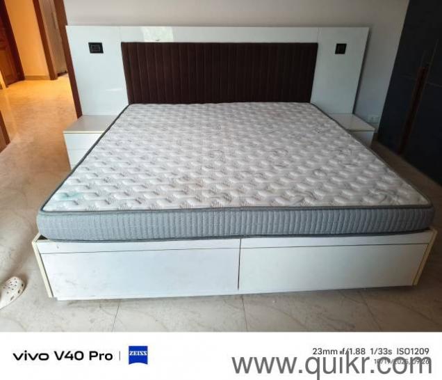 Double bed with branded 8 inch mattress and attached side tables