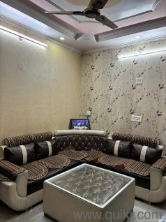 Elegant L-shaped sofa with stylish center table