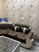 Elegant L-shaped sofa with stylish center table(3)