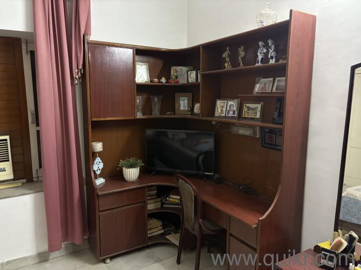 Excellent wall unit teak polish L shaped size 5 fix 4 ft price 7500// and one dressing table with drawers and big mirror 3500/-(1)