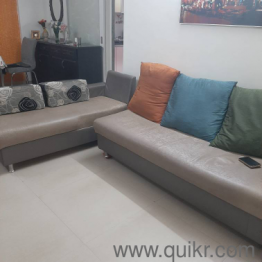 L shaped sofa, separable into two with 4 pillows.(3)