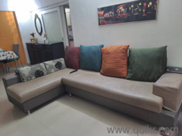 L shaped sofa, separable into two with 4 pillows.(2)