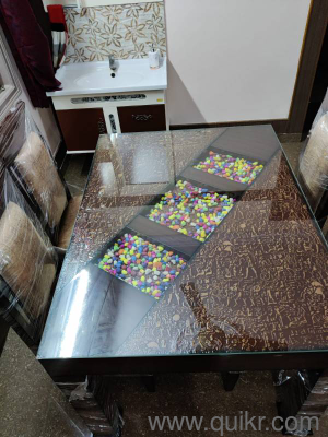 4 seater gently used dining table(2)