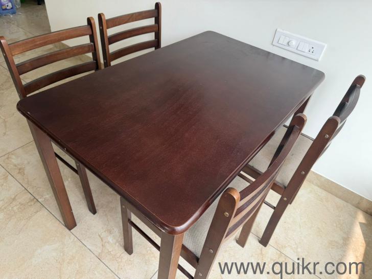 Dining table with 4 chairs.  1 chair leg broken but fixed. Able to sit.