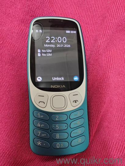 Nokia 3210 (1 year warranty)