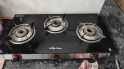 Surya Flame Three burner glass top Gas stove  :|: 2100,Almost Like New,Individual,Used