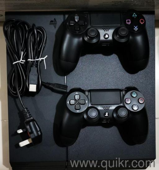 Sony PlayStation 4 Slim, 500GB, 2 controller with 2 cd games free and 6