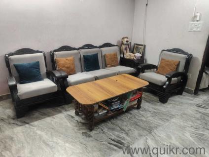 Teak wood sofa with durable table