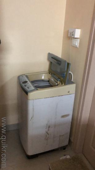 Second hand washing machine but clean working properly along cloth hanger(2)