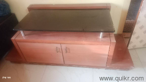 Laminated furniture rare piece ideal for families. Table with multiple use with enough space for storage.