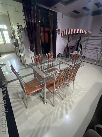 Glass top dining table with 6 chairs