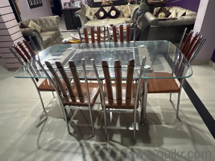 Glass top dining table with 6 chairs(1)